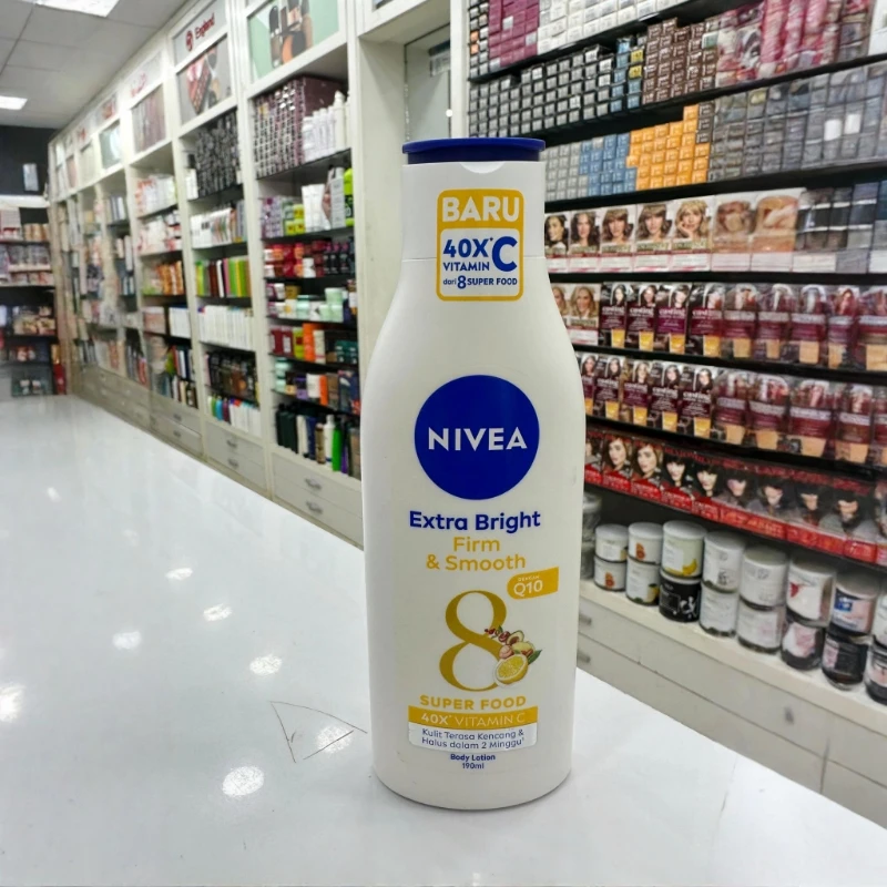 Nivea Extra Bright Protect & Repair Vitamin- C Body Lotion (190ml) 2 Nivea Extra Bright Protect & Repair Vitamin- C Body Lotion (190ml) - Image 2